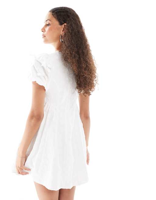 Sister Jane bow embellished mini dress in cream | ASOS