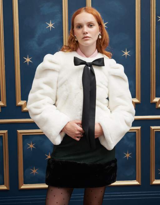Sister Jane bow front faux fur jacket in cream and black