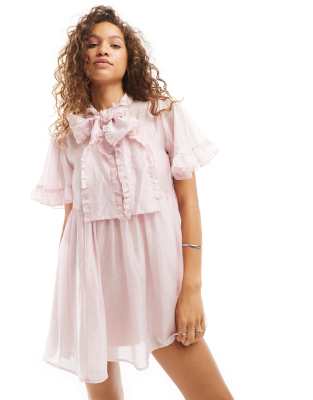 bow ruffle mini dress in pink