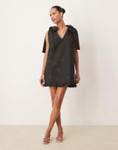 Sister Jane jacquard bow mini dress in black | ASOS