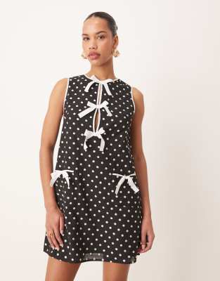Shop Sister Jane Contrast Bow Polka Dot Mini Dress In Black