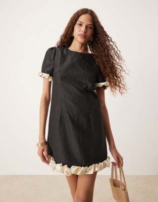 contrast bubble mini dress in black