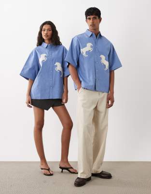 Sister Jane Dala Unisex Horse Detail Applique Boxy Denim Shirt In Blue