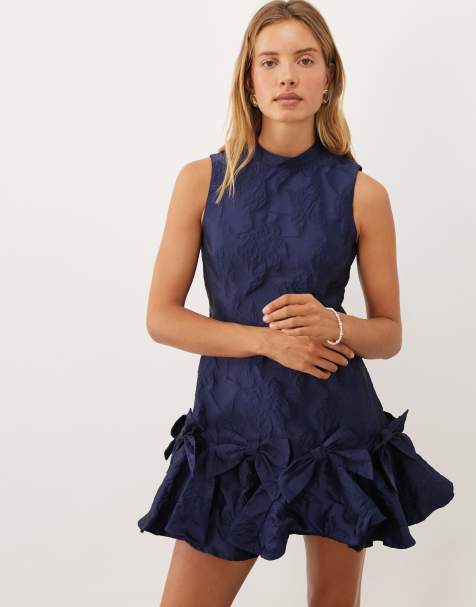 Sister Jane exclusive jacquard sleeveless cinched waist bow hem mini dress in navy - view 1