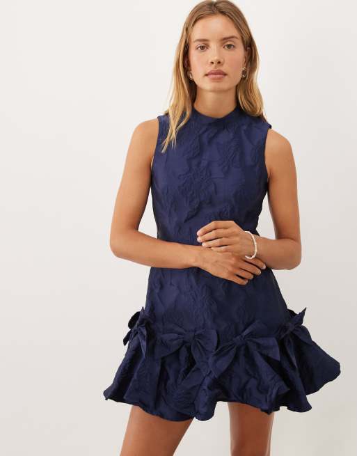 Sister Jane exclusive jacquard sleeveless cinched waist bow hem