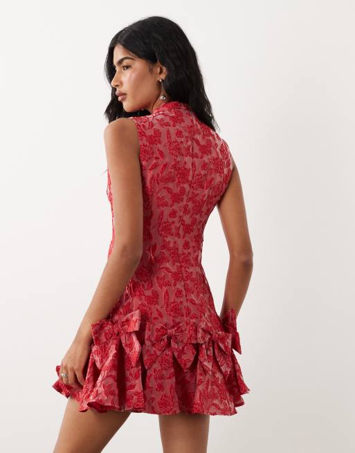 Sister Jane exclusive jacquard sleeveless cinched waist bow hem
