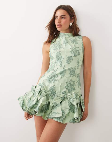 Sister Jane Exclusive - Vestido corto verde claro sin mangas con estampado floral, cintura marcada y lazos en el bajo de jacquard - view 1