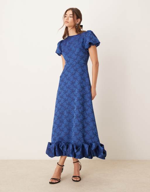 Sister Jane Exklusives wadenlanges Kleid in Mitternachtsblau mit Schleifenprint und Ballonsaum