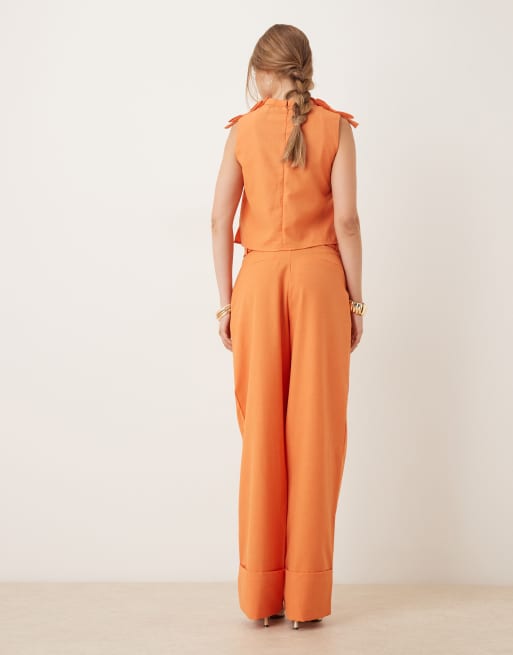 Sister Jane heart belt high rise pants in orange