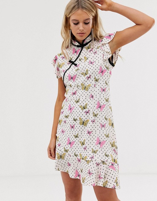 Sister Jane mini dress with peplum hem and frogging in butterfly spot