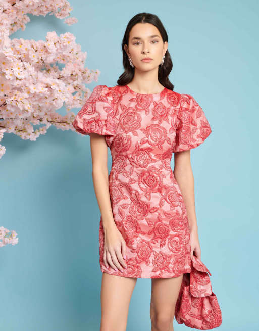 Sister Jane - Mini jurk met geborduurde bloemen en gestrikte achterkant in roze en rood, deel van co-ord set