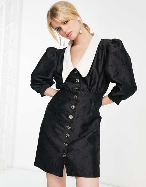 Sister Jane - Mini-jurk met knoopsluiting en contrasterende kraag in zwart jacquard met strikjes