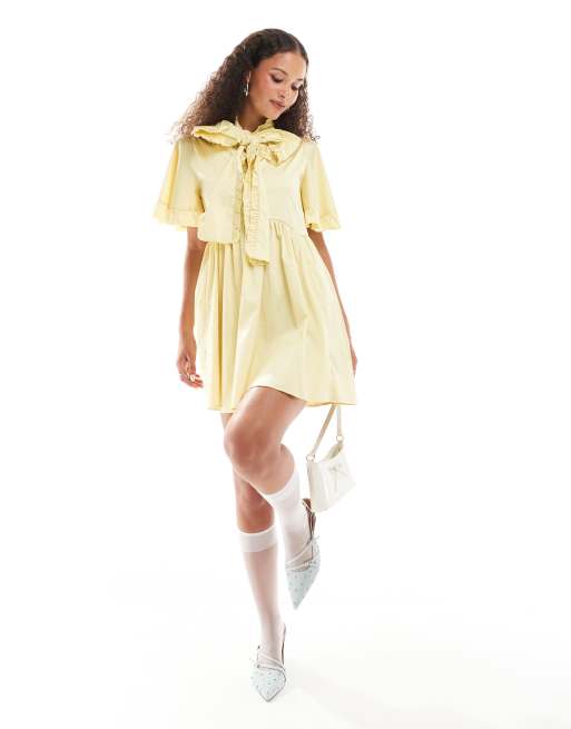 Sister Jane – Minikleid in Gelb mit Rüschen und Schleife