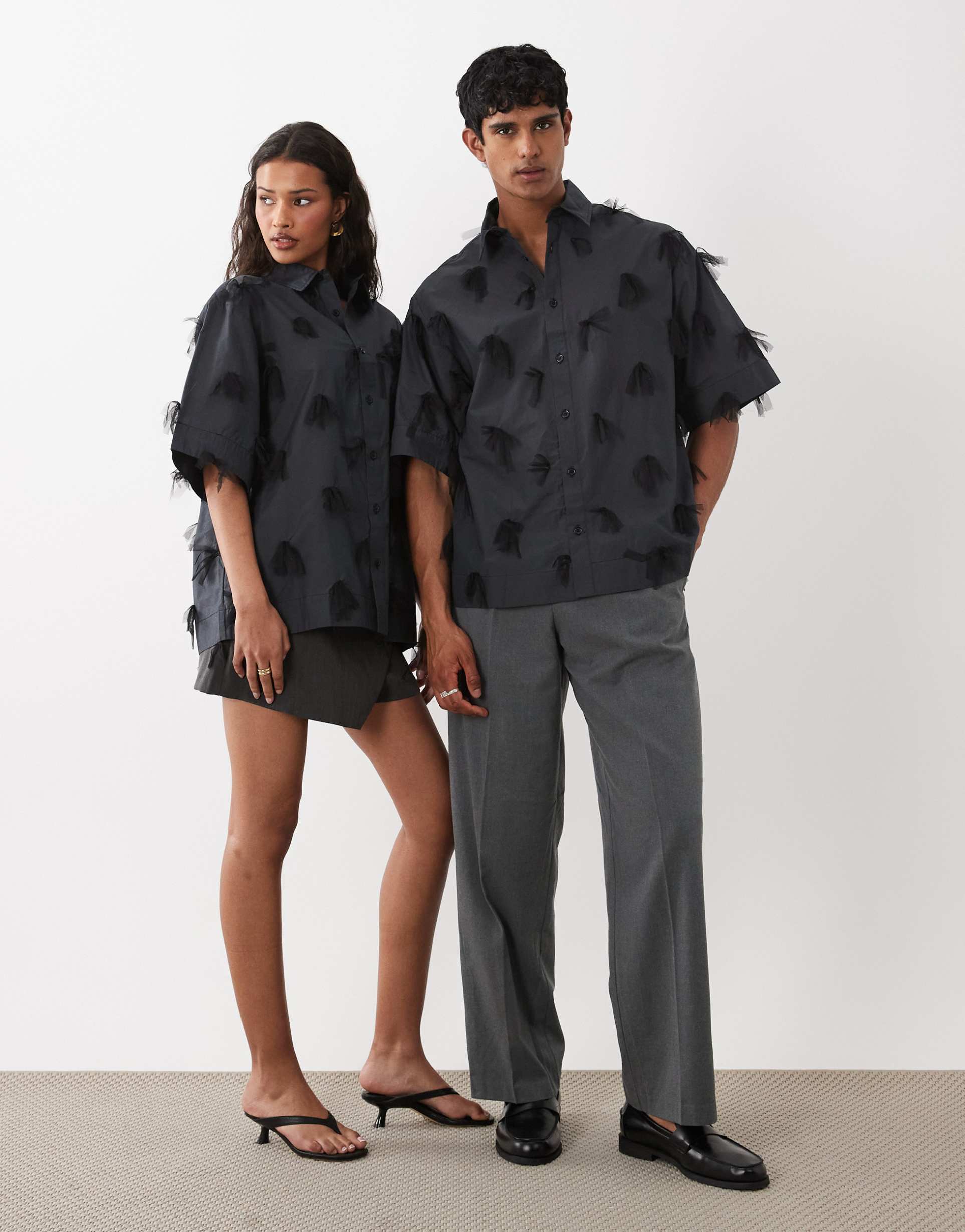 sister jane nilsson unisex cotton mesh bow detail boxy short sleeve shirt in black