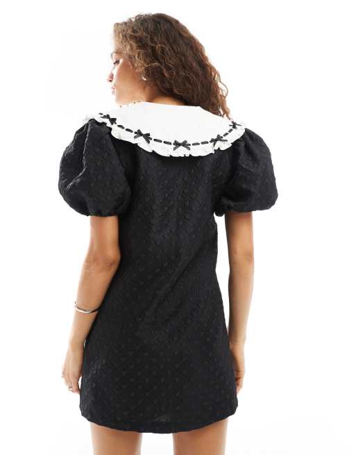 Sister Jane oversized contrast bow collar mini dress in black | ASOS