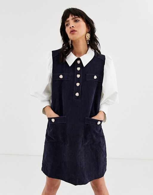 Sister Jane pinafore dress with shirt layer and heart buttons in cord