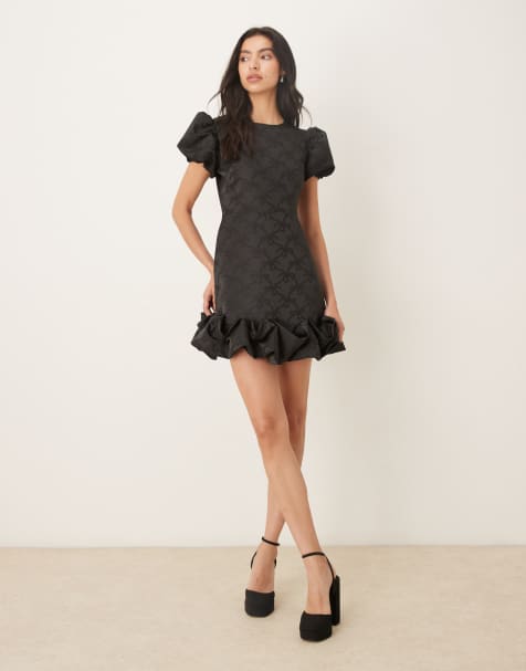 Sister Jane puff sleeve ruffle hem mini dress in black bow print - view 1
