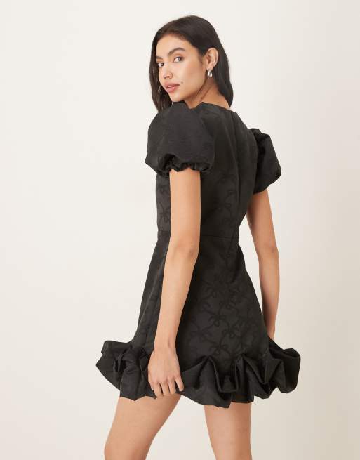 Sister Jane puff sleeve ruffle hem mini dress in black bow print, 2 of 4