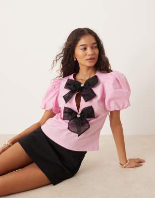 sister jane Sister Jane puff sleeve top with bow front in pink
