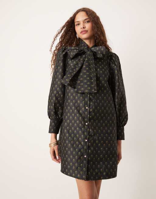 Sister Jane - Robe courte à jacquard nouée sur le devant à finition métallisée - Noir