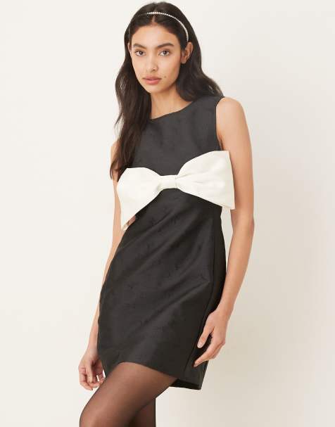 Sister Jane sleeveless shift dress in black with contrast white bow - view 1