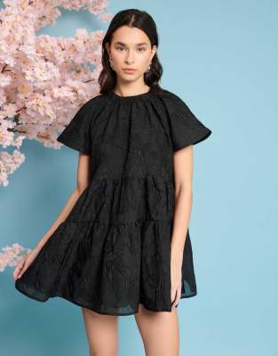 textured rose jacquard mini dress in black