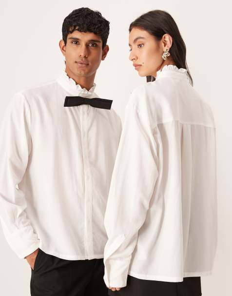 Sister Jane Unisex Duke ruffle collar long sleeve shirt in white with contrast black bow tie