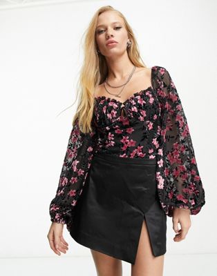 Sisters Of The Tribe bodysuit with frill edge and tie front in black with pink floral burnout