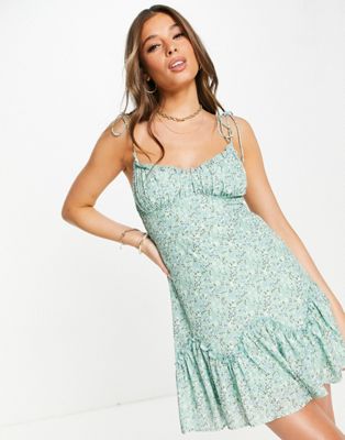 Sisters Of The Tribe cami mini dress with frill hem in green ditsy floral