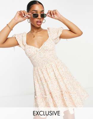 Sisters of the Tribe ditsy print puff sleeve minidress in peach | ASOS