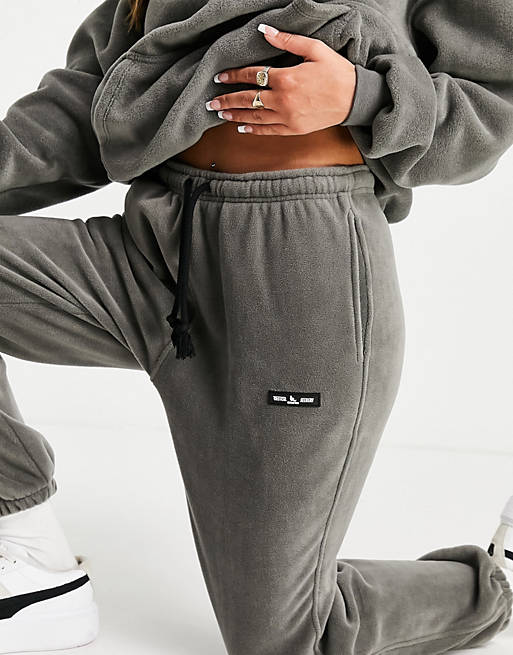 Tracksuits Sisters & Seekers relaxed joggers with embroidered logo in grey co-ord 