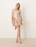 [Six Stories] Six Stories drop hem bow back mini dress in soft gold 44 Soft Gold