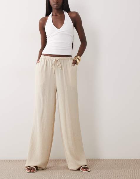 Six Stories high waisted flowy trousers in stone - view 1