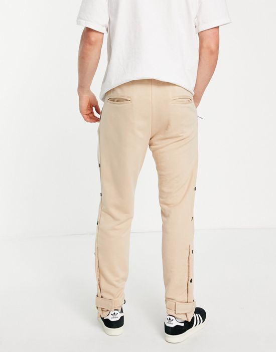 https://images.asos-media.com/products/sixth-june-90s-snap-sweatpants-in-beige/202504351-4?$n_550w$&wid=550&fit=constrain