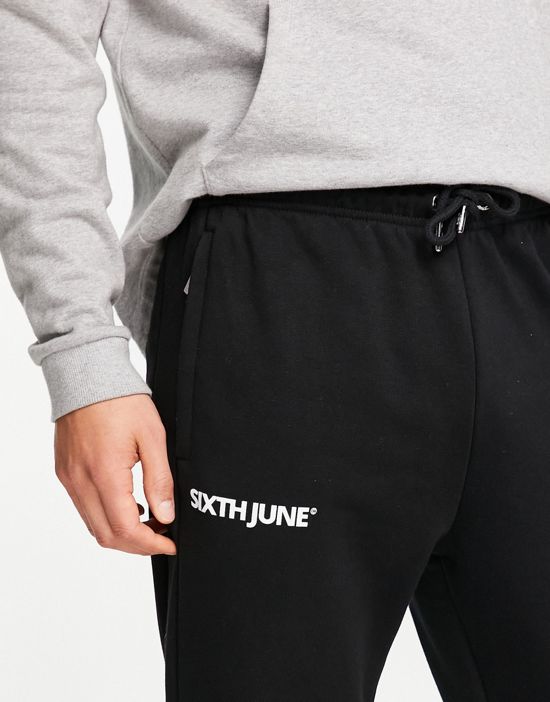 https://images.asos-media.com/products/sixth-june-90s-snap-sweatpants-in-black/202504434-3?$n_550w$&wid=550&fit=constrain