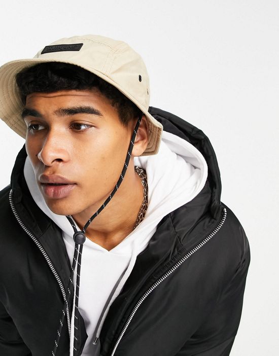 https://images.asos-media.com/products/sixth-june-bucket-hat-in-beige/24099387-4?$n_550w$&wid=550&fit=constrain