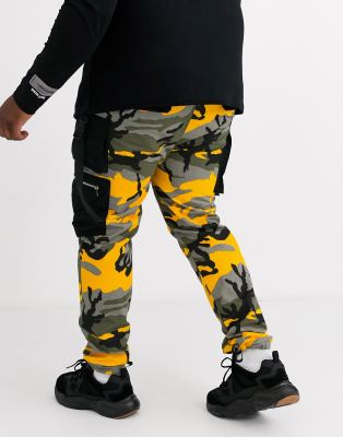 yellow and black camouflage pants