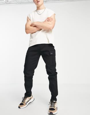 cargo pants in black with inseam side zip