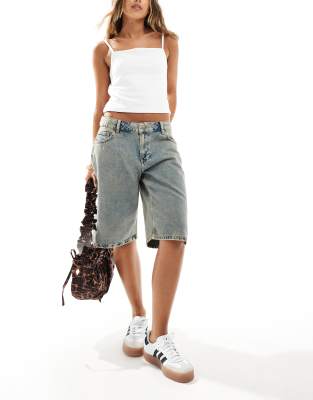 low rise dirty wash longer length shorts in blue