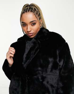 black faux fur coat