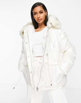 white puffer coat with fur hood