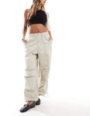 parachute pants in off-white