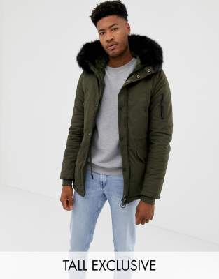 green parka with black fur hood