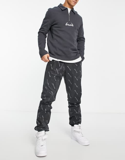 Sixth June - Reflecterende joggingbroek met print in zwart