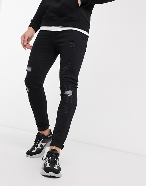 Sixth June reflective patch skinny jeans with rips in black