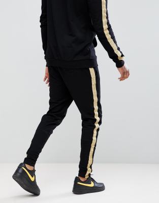 gold side stripe trousers