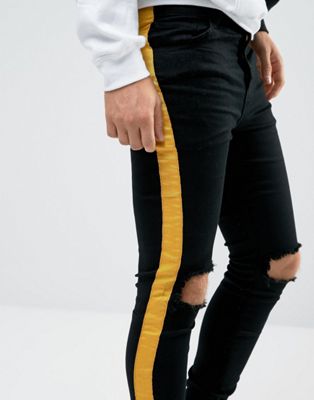 black pants with yellow stripe
