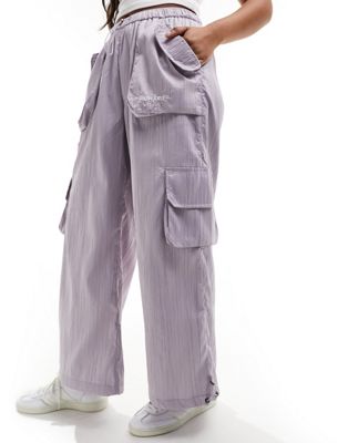 texture nylon cargo pants in purple