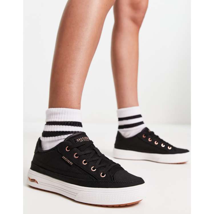 Skechers Arcade canvas lace up sneakers in black and white