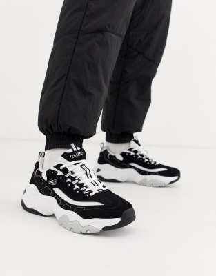white and black chunky trainers